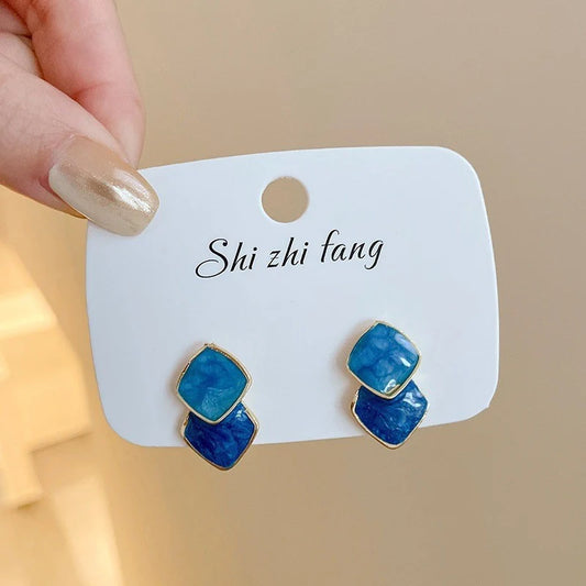 2 Pairs - Simple splicing contrast color earrings (1 pair price Rs.45)