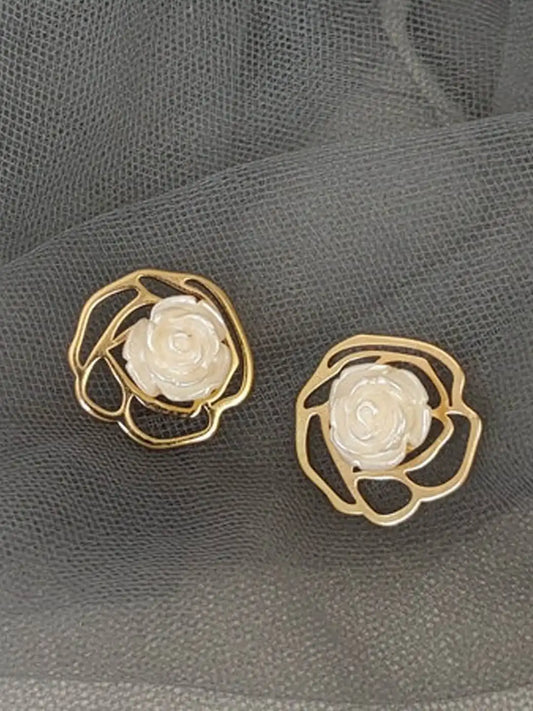 Gold-toned stud earrings(2 pairs) Net price Rs.60
