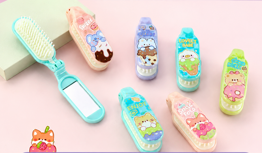 A set of folding mirror hairbrushes in multiple pastel colors with cute cartoon character prints, displayed on a pink background with Chinese text and a product specification table at the bottom.