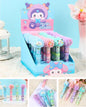 A retail display box filled with pastel-colored plush erasers, shown with smaller inset photos of the individual erasers and Chinese product text. The erasers feature cartoon characters and soft colors like pink, blue, purple, and green.