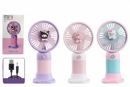 Three mini USB charging fans in pastel purple, pink, and light blue, each with a cute cartoon character on the fan blade, shown alongside a product box, a USB charging cable, and text reading 'KQ0623 144pcs ctn USB charging Fan'.
